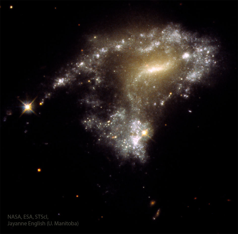 Am1054: ستارگان در اثر برخورد کهکشان ها شکل می گیرند