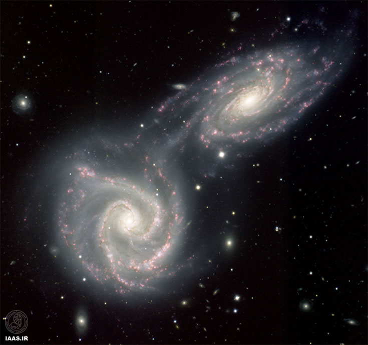 کهکشان‌های مارپیچی در حال برخورد Arp 271